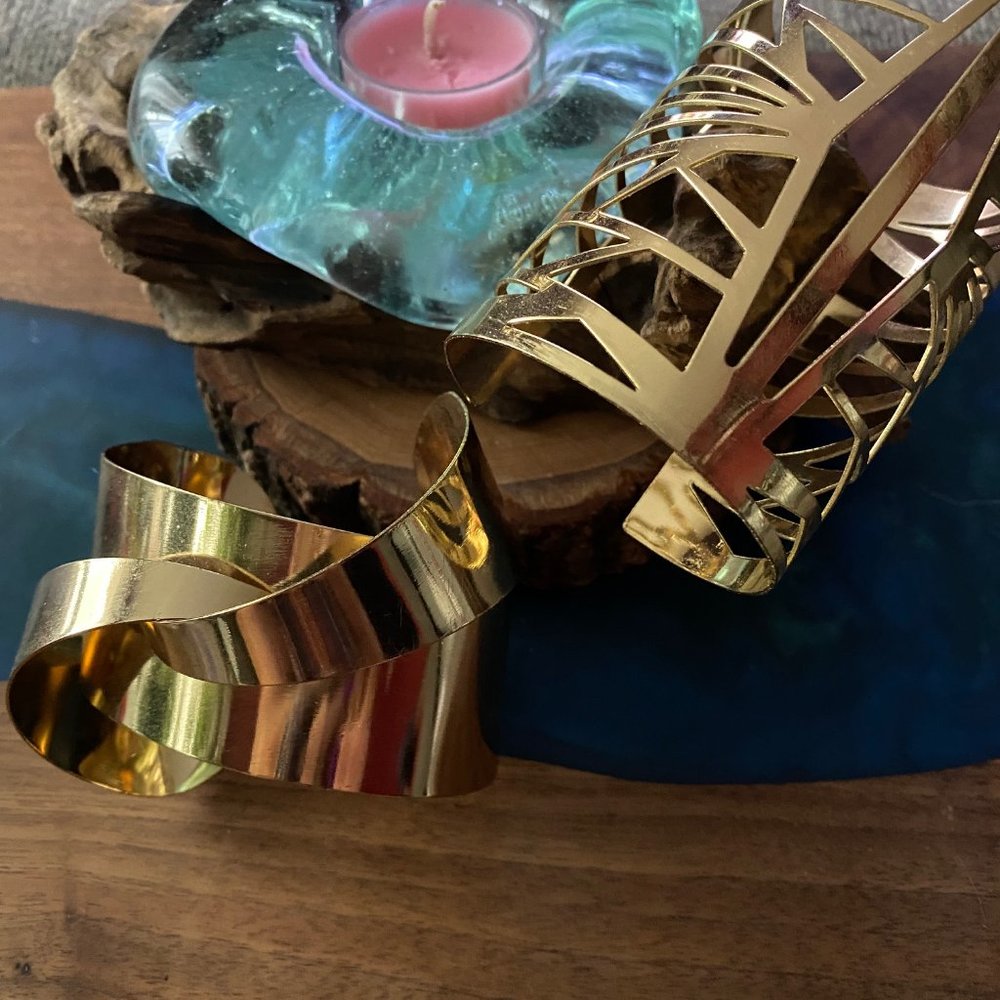 Two gold statement pieces bracelets :-)